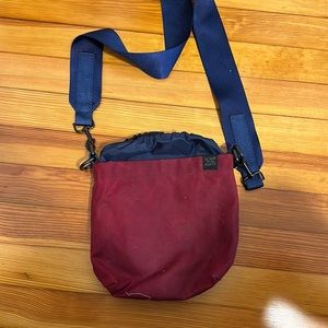 Some of the parts nylon and waxed cotton bucket bag with nylon strap